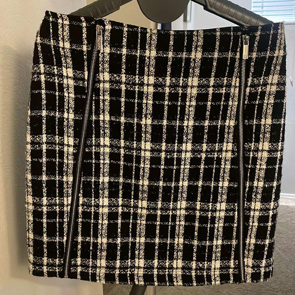 White and black plaid Calvin Klein skirt.